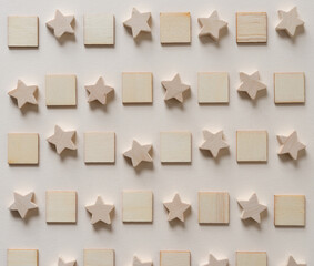 wooden shapes arranged on paper