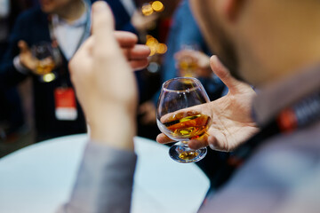 a group of men tasting real whiskey