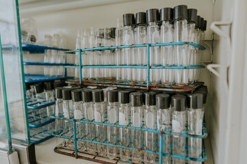 Laboratory glassware, such as flasks, test tubes.