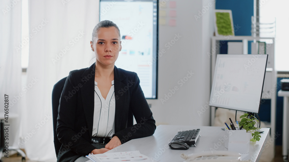 Poster portrait of corporate worker sitting at desk with computer for business planning. entrepreneur prepa