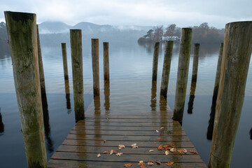 wooden jetty being claimed by unusually high lake. Derwentwater, Keswick, England