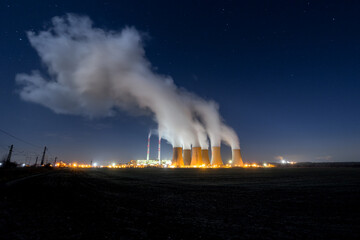 Naklejka na ściany i meble coal fired power station silhouette at night, Pocerady, Czech republic