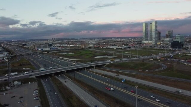 urban footage and cityscapes with twilight skies. aerial drone of residential and commercial neighborhood at Highway 7 and Highway 400 in Vaughan, Canada