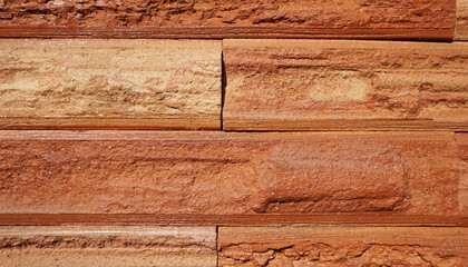Orange brown brick wall They alternate beautifully and naturally for a background or design illustration.