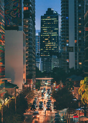 traffic Brickell street Miami Florida city skyline at night people cars lights skyscrapers buildings life 