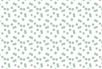 緑の水玉の白背景の壁紙
