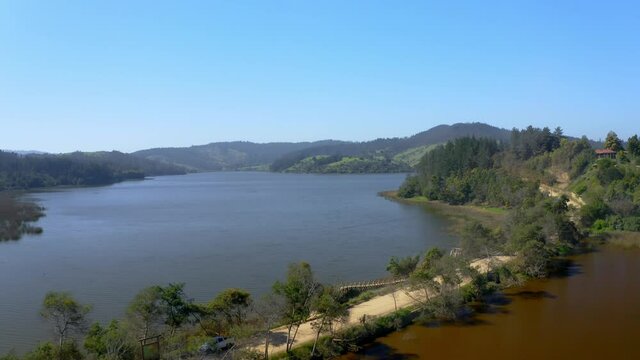 Laguna torca, curico region of maule, travel through chile drone shot wide shot traveling out
