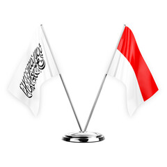 Two table flags isolated on white background 3d illustration, afghanistan and indonesia