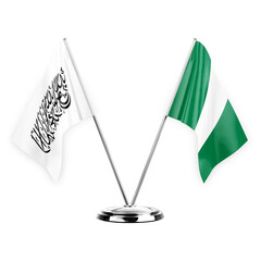 Two table flags isolated on white background 3d illustration, afghanistan and nigeria