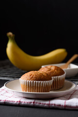 Healthy breakfast banana cake on black background