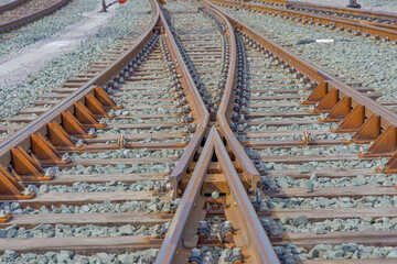 Train railroad tracks intersection close up