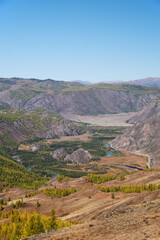 Fototapeta na wymiar Autumn highland landscape. Altai river Chuya surrounded by mountains. Altai, Russia.