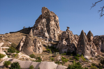 Fototapeta na wymiar Cave and rock formations in Goreme, Cappadocia, Turkey