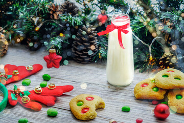 Christmas baking. Ginger dough for gingerbread, gingerbread men, stars, Christmas trees, rolling pin, flour. On the home kitchen white marble table. Copy space