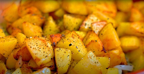 fried potatoes with onions and spices