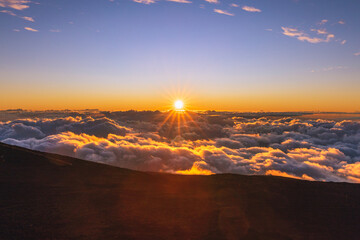 Sunset Above the Clouds