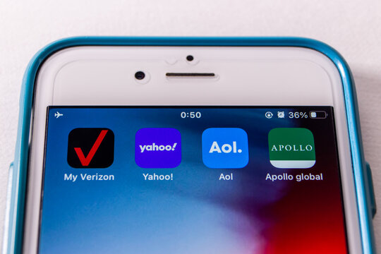 Kumamoto, JAPAN - May 4 2021 : Icons of Verizon, Yahoo!, Aol and Apollo Global Management on iPhone. Verizon announced that to sells own medias including Yahoo and AOL to Apollo Global in 2021