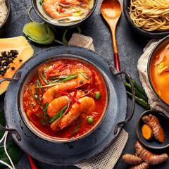Traditional Thai food on dark background.