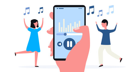 hand holds the phone. Online music app concept. Women and a man stand next to a large phone and listen to music