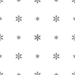 Winter seamless pattern with cartoon hand drawn snowflakes on white background.