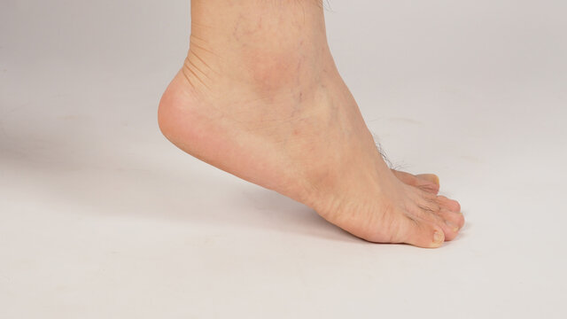 Asian Male heel barefoot is isolated on white background.