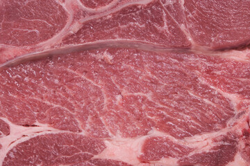 Background and texture, a piece of pork meat close up.