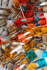 Microelectronics Ideas. Closeup Shot of Batch of Colorful Fusable External Connectors Placed Bulk On White.