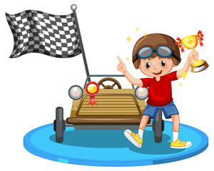 Winner boy holding trophy standing in front of race car