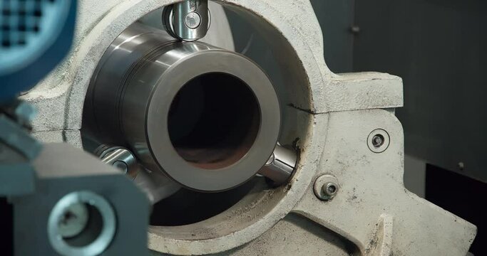 Detail of a lathe cutter with a carbide insert when machining a duralumin cylindrical part. Treatment.