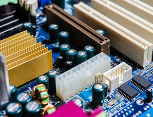 Electronic components on a computer motherboard close up