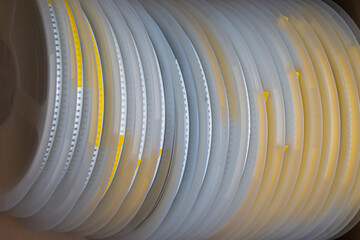 Microelectronics Concepts. Stack of SMD or Surface Mount Components On Tape and Reel Holders in One Batch Together.