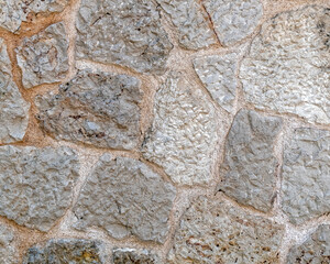 rough randpm cut grey stone wall closeup, space for your text