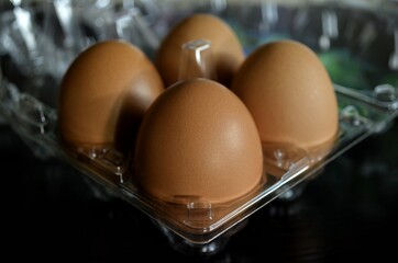fresh eggs in plastic packages