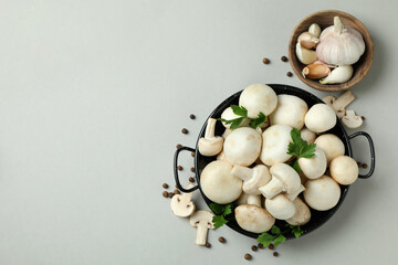 Concept of tasty food with champignon on white