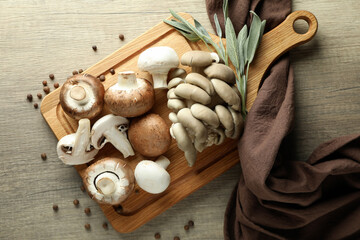 Concept of tasty food with mushrooms on wooden background