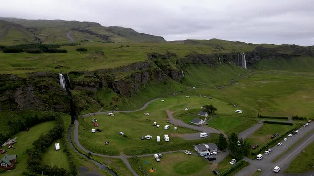 Cinematic aerial footage of the Beautiful Seljalandsfoss and Gljufrabui waterfalls in Iceland on summer