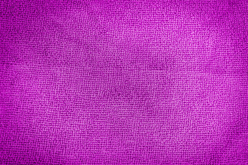 Close-up of abstract fabric texture as background for text or interior design. Purple artificial fabric texture.  