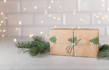 Christmas Gifts minimalism wrapping with Fir Branches on White Background front view, Winter Holidays Concept. High quality photo