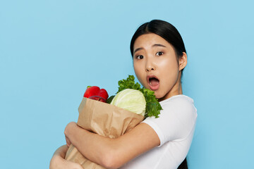 woman asian appearance food package healthy food blue background