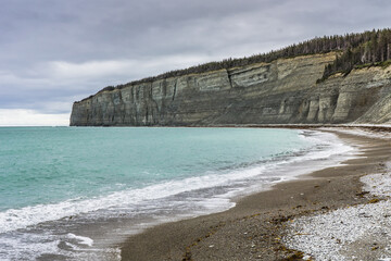 View on Baie de la Tour, the most famous bay with its white cliffs of Anticosti national park, an island located in the St Lawrence estuary, in Cote Nord region of Quebec, Canada