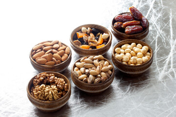 nuts and dried fruits in bamboo plates