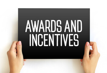 Awards & Incentives text on card, concept background