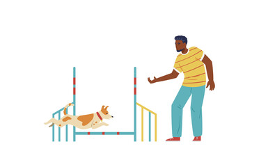 African american man training his Jack Russell Terrier dog on agility field. Dog jumping on agility course. Isolated.