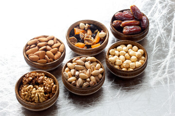 nuts and dried fruits in bamboo plates