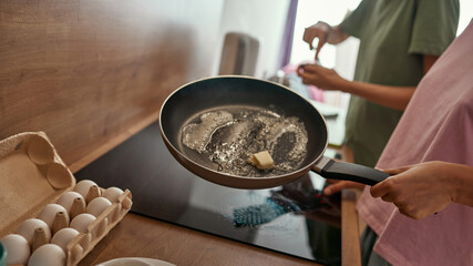 Cropped of girls cooking breakfast at home kitchen