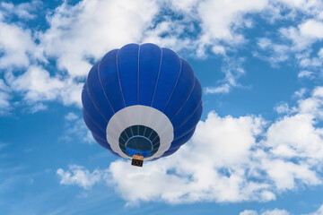 Hot air balloon flight over blue sky. European hot air balloon festival.