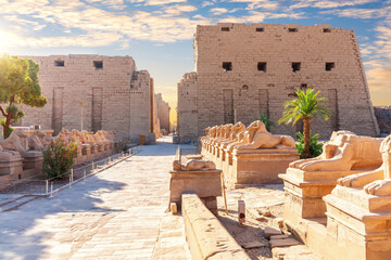 Ram-headed sphinx statues near Karnak Temple entrance, Luxor, Egypt