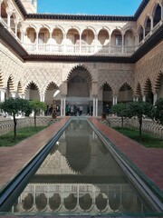 Obraz premium The stunning architecture and details with mosaics and arches from the Real Alcazar Palace (City of Dorne from Game of Thrones) in Sevilla, Spain