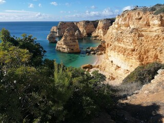 The stunning beautiful coastline landscapes along the Algarve in Portugal during sunset