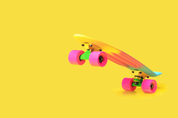 Pastel neon rainbow colored Penny board skateboard standing on two wheels isolated on solid yellow background. Plastic mini cruiser Youth minimalistic Sport inspired summer fun concept. Copy space.